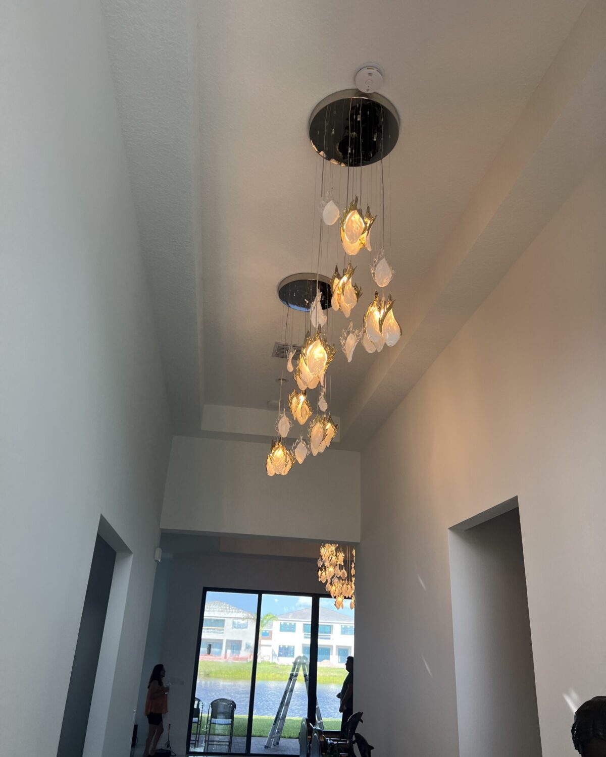 Customized Chandeliers for private residence Lotus Palm, Boca Raton, Florida, installed — photograph 2